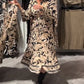 Elegante jurk met lange mouwen en bloemenprint