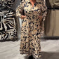 Elegante jurk met lange mouwen en bloemenprint