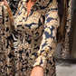 Elegante jurk met lange mouwen en bloemenprint