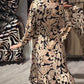 Elegante jurk met lange mouwen en bloemenprint
