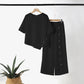 👚👖 Vrouwenset met onregelmatige zoom, top en broek met wijde pijpen